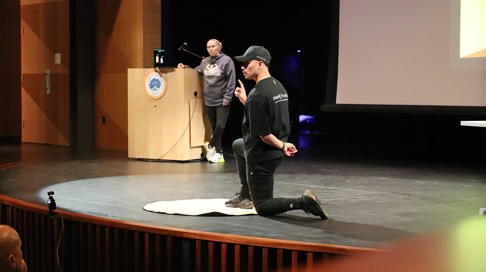 Luis presenting to coaches during a practical lecture