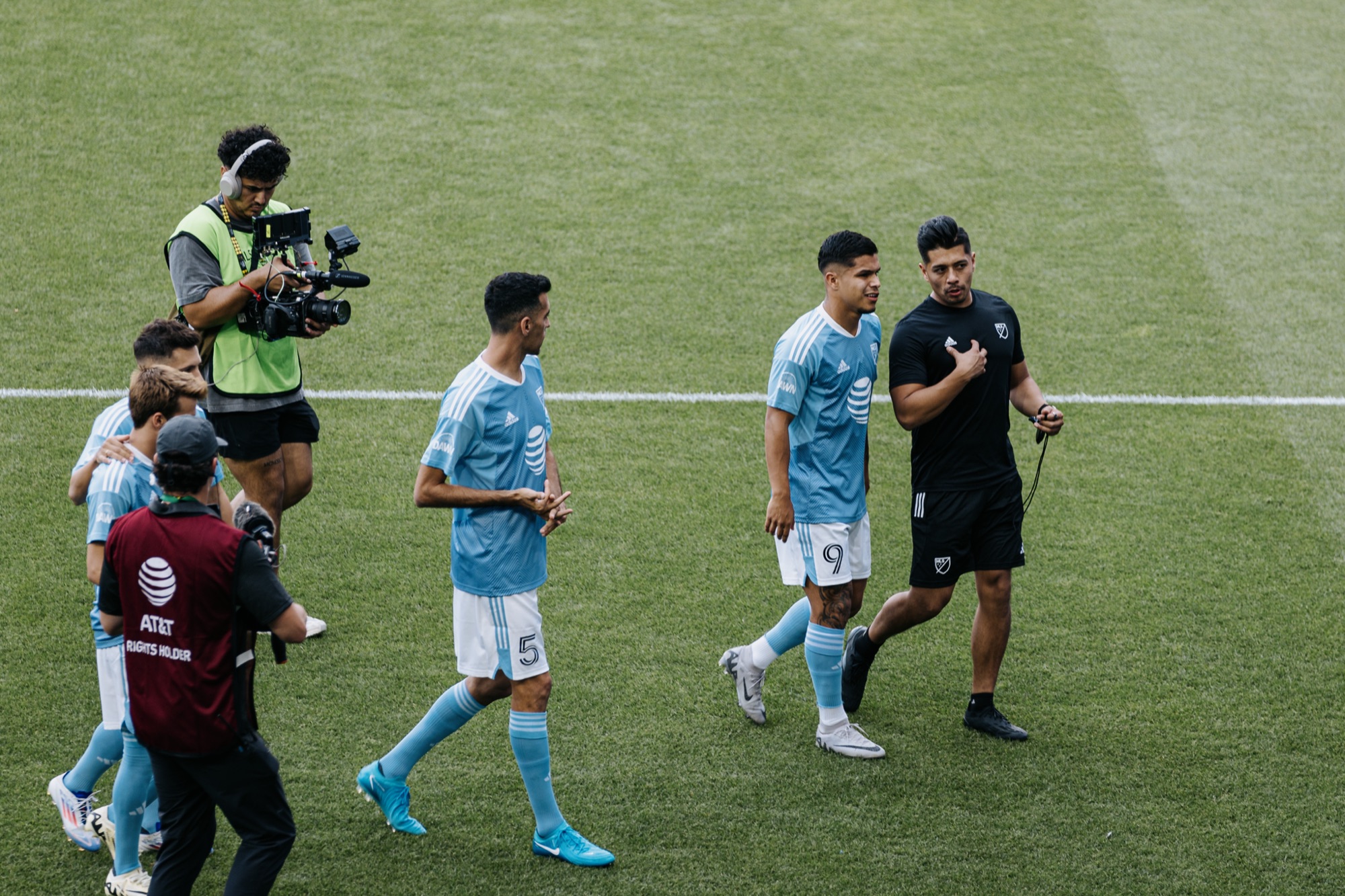Professional soccer players training with Luis